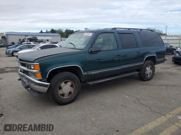 1999 Chevrolet Suburban with VIN 1GNFK16R9XJ516000, listed as a Copart auction lot 73854994 with 263,079 mi miles and Salvage Title. Bid and sale history available at carsss.com. Image 1.