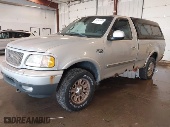2001 Ford F-150 XL with VIN 2FTRF18W31CB06246, listed as a IAAI auction lot 42307983 with 148,440 mi miles and . Bid and sale history available at DreamBid. Image 2.