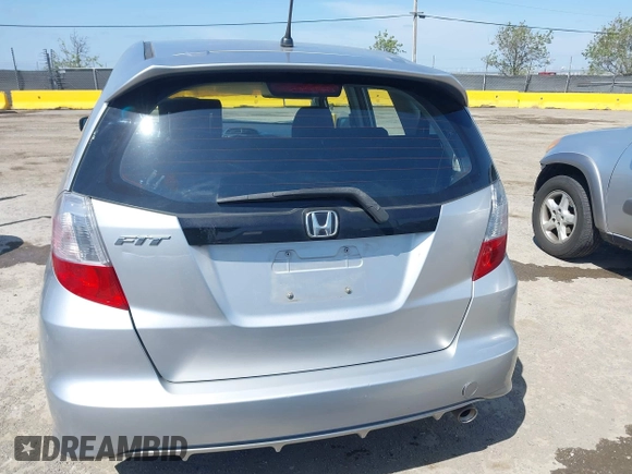 2013 Honda Fit Sport with VIN JHMGE8H51DC005760, listed as a IAAI auction lot 42040427 with 184,375 mi miles. Bid and sale history available at carsss.com. Image 16.