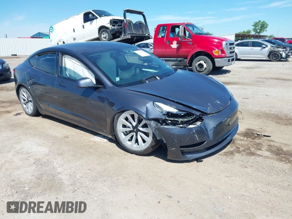 2023 Tesla Model 3 with VIN 5YJ3E1EAXPF617388, listed as a IAAI auction lot 42218748 with Not provided miles and . Bid and sale history available at DreamBid. Image 6.