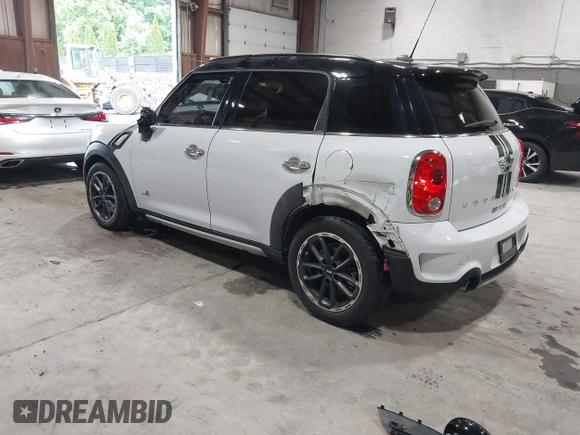 2016 MINI Countryman S with VIN WMWZC5C57GWU20085, listed as a IAAI auction lot 42403406 with 90,592 mi miles and . Bid and sale history available at DreamBid. Image 3.