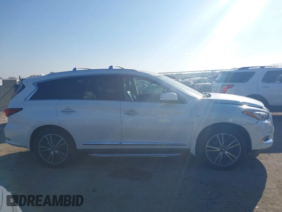 2017 Infiniti QX60 with VIN 5N1DL0MM2HC550358, listed as a IAAI auction lot 41664787 with 133,024 mi miles and . Bid and sale history available at DreamBid. Image 13.