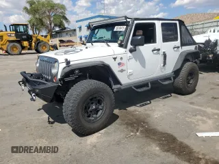 2013 Jeep Wrangler Unlimited Sport z VIN 1C4BJWDGXDL579910, wystawiony jako Copart lot #56246415 z przebiegiem 87 639 mil mil oraz Szkoda całkowita • Salvage title. Historia ofert i sprzedaży dostępna na DreamBid. Obrazek 1.