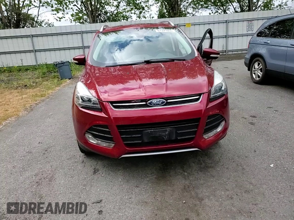 2015 Ford Escape Titanium with VIN 1FMCU9J94FUB92166, listed as a Copart auction lot 61371055 with 96,439 mi miles and Salvage title. Bid and sale history available at DreamBid. Image 15.