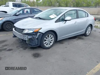 2012 Honda Civic EX with VIN 2HGFB2F81CH610374, listed as a IAAI auction lot 42019951 with 109,835 mi miles and . Bid and sale history available at DreamBid. Image 18.