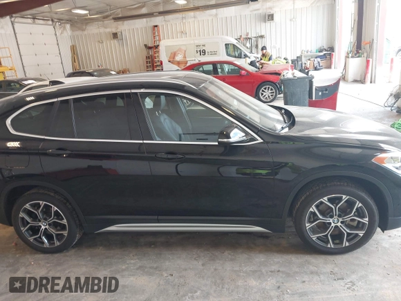 2022 BMW X1 xDrive28i with VIN WBXJG9C09N5U69567, listed as a IAAI auction lot 42273644 with 36,944 mi miles and . Bid and sale history available at DreamBid. Image 13.