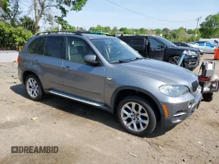2011 BMW X5 35i z VIN 5UXZV4C55BL413040, wystawiony jako Copart lot #55246415 z przebiegiem 184 352 mil mil oraz Czysty tytuł • Clean title. Historia ofert i sprzedaży dostępna na DreamBid. Obrazek 4.