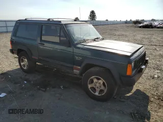 1995 Jeep Cherokee Sport with VIN 1J4FJ67S4SL519629, listed as a Copart auction lot 76107844 with 312,532 mi miles and Salvage Title. Bid and sale history available at carsss.com. Image 4.