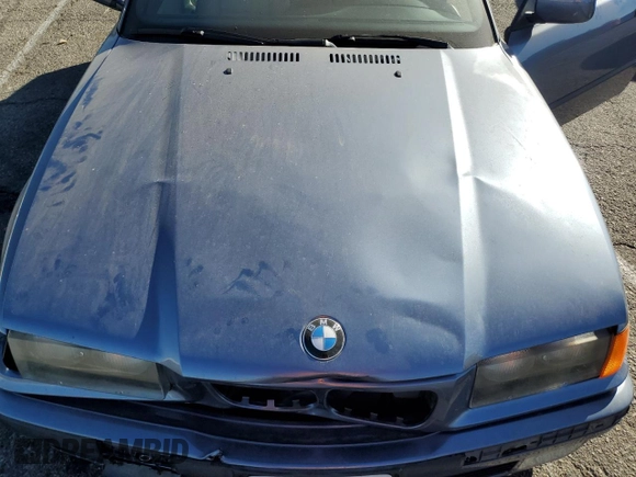 1999 BMW 3 Series 323icA with VIN WBABJ8332XEM24560, listed as a Copart auction lot 80756544 with 63,056 mi miles and Salvage Title. Bid and sale history available at carsss.com. Image 11.