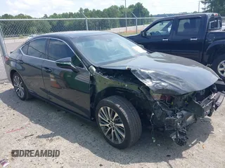2021 Lexus ES 300h with VIN 58ADA1C15MU006579, listed as a IAAI auction lot 42483137 with 92,030 mi miles and . Bid and sale history available at DreamBid. Image 1.