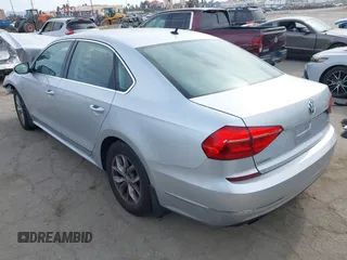 2016 Volkswagen Passat S with VIN 1VWAT7A32GC053916, listed as a IAAI auction lot 42288513 with 145,882 mi miles and . Bid and sale history available at DreamBid. Image 3.