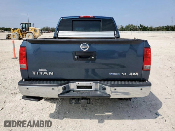 2013 Nissan Titan Pro-4X with VIN 1N6BA0EC3DN310741, listed as a Copart auction lot 57171975 with 146,524 mi miles and Salvage title. Bid and sale history available at DreamBid. Image 6.