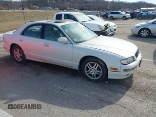 1999 Mazda Millenia with VIN JM1TA2214X1502235, listed as a IAAI auction lot 41476231 with 201,158 mi miles and . Bid and sale history available at DreamBid. Image 1.