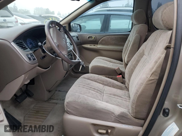 2001 Toyota Sienna LE with VIN 4T3ZF13C01U333507, listed as a Copart auction lot 86604984 with 192,377 mi miles and Salvage Title. Bid and sale history available at DreamBid. Image 7.