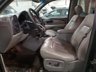 2002 Oldsmobile Bravada z VIN 1GHDT13S522107056, wystawiony jako Copart lot #86296454 z przebiegiem 169 856 mil mil oraz Tytuł czysty. Historia ofert i sprzedaży dostępna na DreamBid. Obrazek 7.