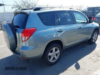 2006 Toyota RAV4 with VIN JTMZD33V465012121, listed as a IAAI auction lot 42013354 with 214,726 mi miles. Bid and sale history available at carsss.com. Image 4.