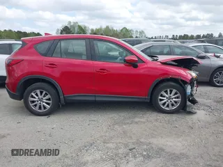2016 Mazda CX-5 Sport with VIN JM3KE2BY9G0911535, listed as a IAAI auction lot 41906402 with 134,477 mi miles. Bid and sale history available at carsss.com. Image 14.