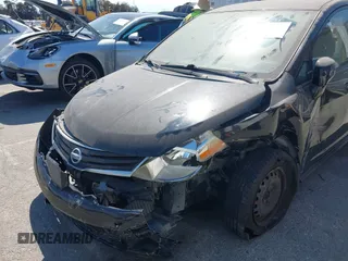 2012 Nissan Versa S with VIN 3N1BC1CPXCK250702, listed as a IAAI auction lot 41899436 with 136,378 mi miles. Bid and sale history available at carsss.com. Image 6.