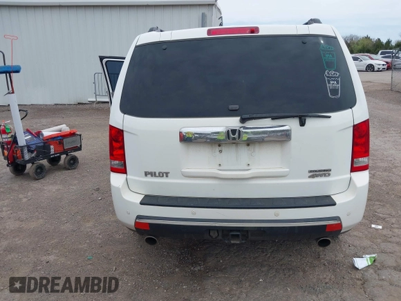 2009 Honda Pilot Touring with VIN 5FNYF48929B032510, listed as a IAAI auction lot 41945923 with 236,256 mi miles and . Bid and sale history available at carsss.com. Image 17.