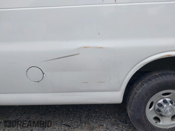2014 Chevrolet Express Cargo with VIN 1GCWGFBA1E1210672, listed as a IAAI auction lot 42184397 with 174,364 mi miles and . Bid and sale history available at DreamBid. Image 17.