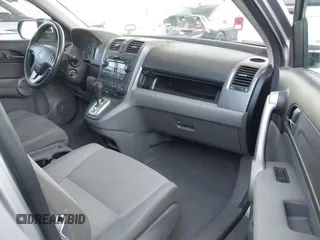 2007 Honda CR-V EX with VIN JHLRE38557C069515, listed as a IAAI auction lot 42121504 with 153,971 mi miles and . Bid and sale history available at carsss.com. Image 5.