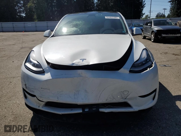 2020 Tesla Model Y Long Range with VIN 5YJYGDEF9LF023060, listed as a Copart auction lot 55462395 with 58,211 mi miles and Salvage Title. Bid and sale history available at DreamBid. Image 5.
