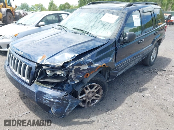 2004 Jeep Grand Cherokee Laredo with VIN 1J4GW48N94C407642, listed as a IAAI auction lot 42381436 with 177,141 mi miles and . Bid and sale history available at DreamBid. Image 6.