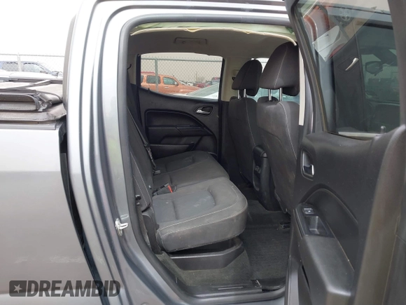 2018 Chevrolet Colorado 2WD LT z VIN 1GCGSCEN0J1223004, wystawiony jako IAAI lot #41782378 z przebiegiem 67 818 mil mil oraz . Historia ofert i sprzedaży dostępna na DreamBid. Obrazek 8.