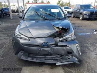 2022 Toyota Prius L Eco with VIN JTDKAMFU7N3155268, listed as a IAAI auction lot 41589024 with 158,430 mi miles. Bid and sale history available at carsss.com. Image 12.