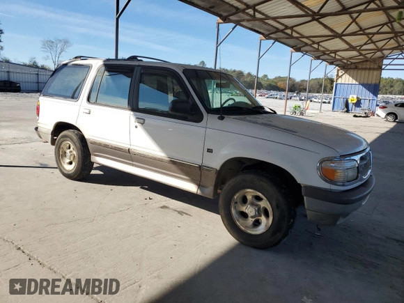 1997 Ford Explorer XLT with VIN 1FMDU32P7VUA19965, listed as a Copart auction lot 79505124 with 140,231 mi miles and Salvage title. Bid and sale history available at DreamBid. Image 4.