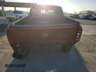 2014 Ram 1500 SLT z VIN 1C6RR7GT3ES269702, wystawiony jako Copart lot #50360525 z przebiegiem 128 813 mil mil oraz Szkoda całkowita • Salvage title. Historia ofert i sprzedaży dostępna na DreamBid. Obrazek 6.