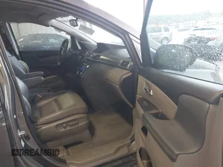 2014 Honda Odyssey EX-L with VIN 5FNRL5H6XEB060090, listed as a IAAI auction lot 41625571 with 112,762 mi miles and . Bid and sale history available at carsss.com. Image 5.