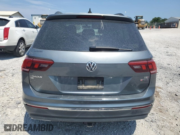 2018 Volkswagen Tiguan SEL с VIN 3VV2B7AX9JM095648, выставлен на аукционе Copart как лот 62558265 с пробегом 104 498 миль миль и Списание • Salvage title. История ставок и продаж доступна на DreamBid. Изображение 6.