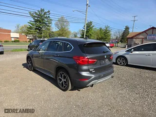 2017 BMW X1 xDrive28i with VIN WBXHT3C32H5F79305, listed as a Copart auction lot 54665865 with 113,046 mi miles and Clean Title. Bid and sale history available at carsss.com. Image 3.