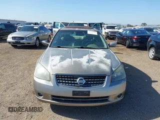 2005 Nissan Altima SE z VIN 1N4BL11E25N493521, wystawiony jako IAAI lot #42259248 z przebiegiem 141 651 mil mil oraz . Historia ofert i sprzedaży dostępna na DreamBid. Obrazek 12.