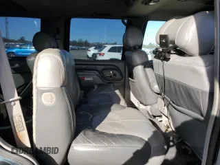 1999 GMC Denali z VIN 1GKEK13R3XR908307, wystawiony jako Copart lot #78595094 z przebiegiem 138 098 mil mil oraz Szkody całkowita. Historia ofert i sprzedaży dostępna na DreamBid. Obrazek 11.