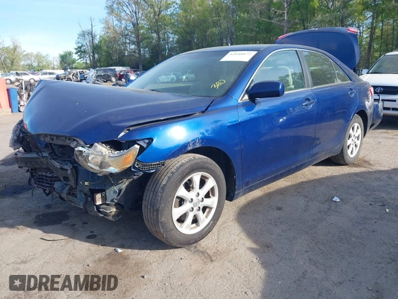 2009 Toyota Camry with VIN 4T1BE46K59U415794, listed as a IAAI auction lot 42048872 with 142,200 mi miles. Bid and sale history available at carsss.com. Image 2.