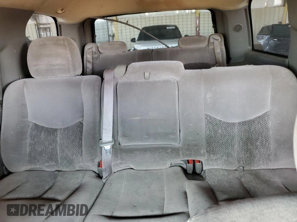 2002 Chevrolet Tahoe LS z VIN 1GNEC13Z52R210208, wystawiony jako Copart lot #58046834 z przebiegiem 228 365 mil mil oraz Czysty tytuł • Clean title. Historia ofert i sprzedaży dostępna na DreamBid. Obrazek 10.