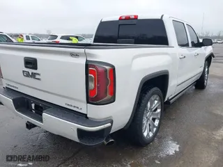 2018 GMC Sierra 1500 Denali with VIN 3GTU2PEJ4JG280332, listed as a IAAI auction lot 41784645 with 119,815 mi miles. Bid and sale history available at carsss.com. Image 4.