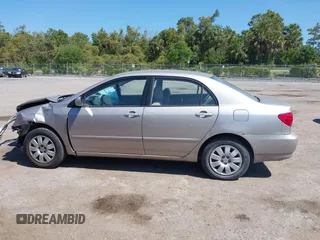 2003 Toyota Corolla CE with VIN 2T1BR32E53C015709, listed as a IAAI auction lot 42057744 with 120,022 mi miles and . Bid and sale history available at DreamBid. Image 14.