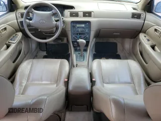 1999 Toyota Camry LE z VIN JT2BF28K9X0199531, wystawiony jako Copart lot #55637275 z przebiegiem Nie podano mil oraz Szkoda całkowita • Salvage title. Historia ofert i sprzedaży dostępna na DreamBid. Obrazek 8.