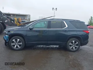 2021 Chevrolet Traverse LT z VIN 1GNEVHKW2MJ195002, wystawiony jako IAAI lot #42314214 z przebiegiem 50 877 mil mil oraz . Historia ofert i sprzedaży dostępna na DreamBid. Obrazek 14.