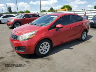2014 Kia Rio LX with VIN KNADM4A33E6326527, listed as a Copart auction lot 56216215 with 98,340 mi miles and Clean Title. Bid and sale history available at DreamBid. Image 1.