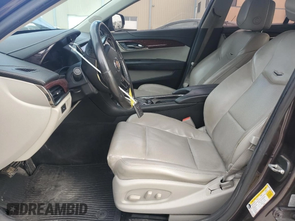 2014 Cadillac ATS Luxury AWD z VIN 1G6AH5R37E0144887, wystawiony jako Copart lot #86176144 z przebiegiem Nie podano mil oraz Szkoda całkowita • Salvage title. Historia ofert i sprzedaży dostępna na DreamBid. Obrazek 7.