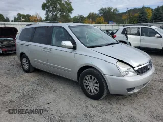 2012 Kia Sedona LX with VIN KNDMG4C79C6496785, listed as a Copart auction lot 73310344 with 130,243 mi miles and Salvage Title. Bid and sale history available at carsss.com. Image 4.