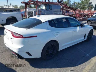 2021 Kia Stinger GT-Line with VIN KNAE15LA5M6088516, listed as a IAAI auction lot 41626750 with 85,152 mi miles. Bid and sale history available at carsss.com. Image 4.
