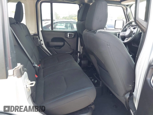 2023 Jeep Wrangler Rubicon with VIN 1C4JJXR63PW703424, listed as a IAAI auction lot 42639653 with 46,412 mi miles and . Bid and sale history available at DreamBid. Image 8.