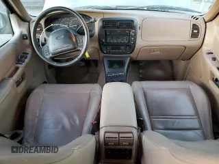 1999 Ford Explorer XLT z VIN 1FMZU32E0XZB31890, wystawiony jako Copart lot #84967184 z przebiegiem 220 424 mil mil oraz Szkoda całkowita • Salvage title. Historia ofert i sprzedaży dostępna na DreamBid. Obrazek 8.