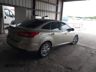 2017 Ford Focus Titanium with VIN 1FADP3J26HL279839, listed as a IAAI auction lot 42466826 with 202,795 mi miles and . Bid and sale history available at DreamBid. Image 4.