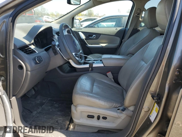 2014 Ford Edge SEL z VIN 2FMDK4JC7EBA36345, wystawiony jako Copart lot #53434145 z przebiegiem 184 955 mil mil oraz Szkoda całkowita • Salvage title. Historia ofert i sprzedaży dostępna na DreamBid. Obrazek 7.